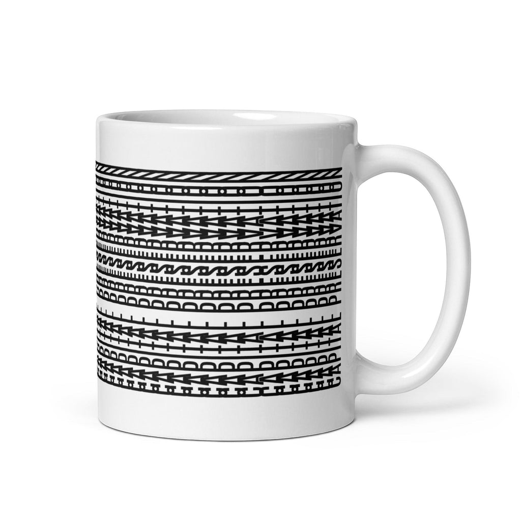 Trader ID Capital Preservation mug with abstract geometric pattern and tribal shield design. White ceramic.